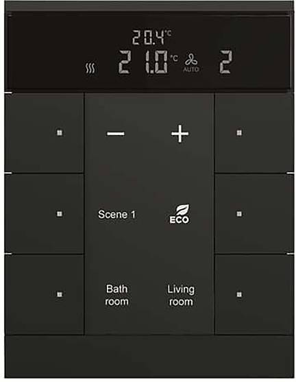 Ein weißes Lineal mit Messskalen, flach auf einer hellgrauen Oberfläche liegend.