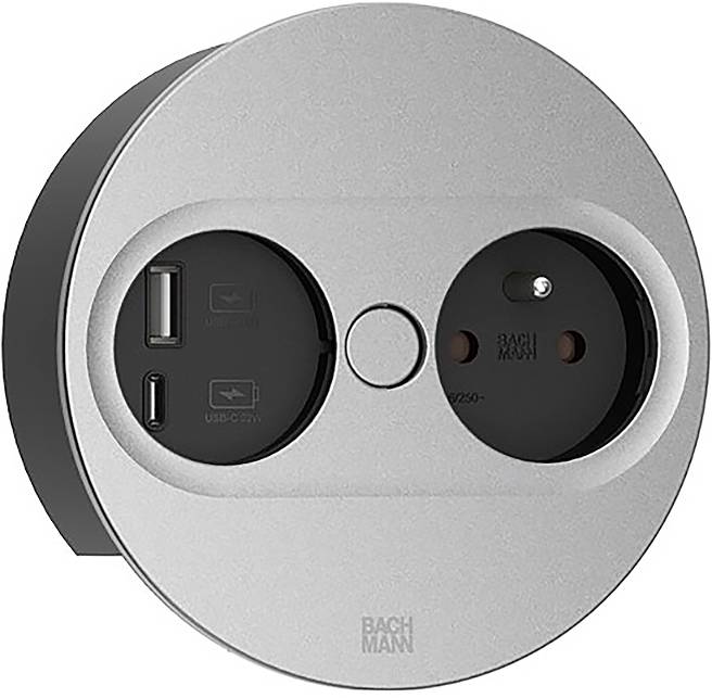 Eine runde Steckdose mit einer Standard-Steckdose und zwei USB-Anschlüssen zum Aufladen elektronischer Geräte. Das Design ist elegant und modern.