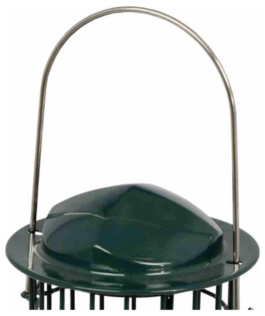 Ein Metallgriff ist an einem grünen Objekt mit abgerundeter Oberseite und kreisförmiger Basis befestigt, das einer Kappe oder Abdeckung ähnelt.