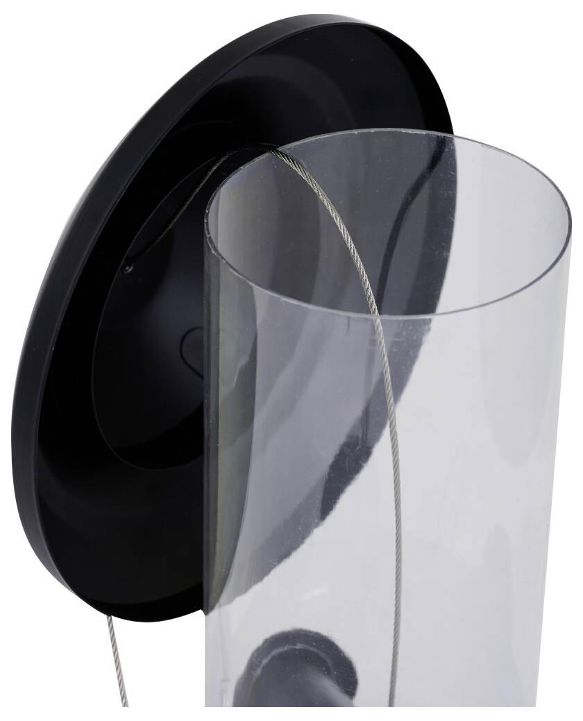 Ein transparenter zylindrischer Behälter, der an einer schwarzen Basis befestigt ist, mit einem dünnen Draht, der von oben verläuft und einer modernen Leuchte ähnelt.