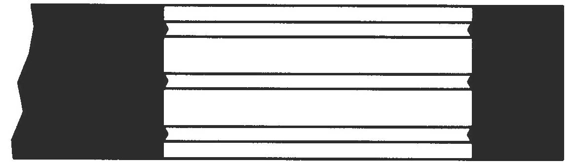 Eine rechteckige Box mit zwei zackigen, unregelmäßigen Formen an der linken und rechten Seite, die gespiegelten zerrissenen Papierändern ähneln.