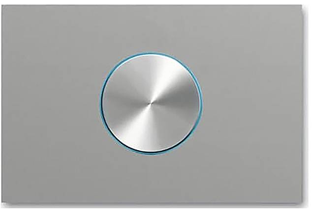 „Ein minimalistischer metallischer Knopf mit blauem Rand auf grauem Hintergrund.