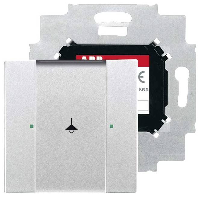 Ein metallischer Lichtschalter mit Lampensymbol, ausgelegt für KNX-Systeme, zeigt Vorderansicht und inneren Mechanismus mit sichtbarer Markenbezeichnung.