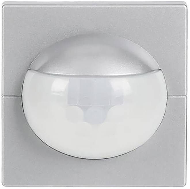 Ein silberner Bewegungsmelder mit gewölbter Linse, zur Wandmontage konzipiert, wird zum Erfassen von Bewegungen in einem bestimmten Bereich verwendet.