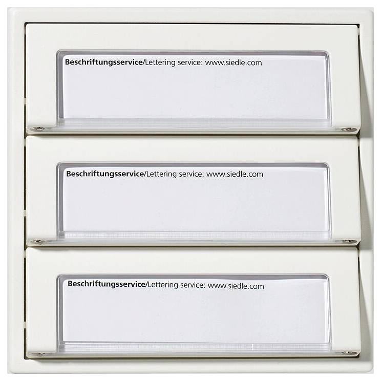 Drei beschriftete Schlitze mit dem Text „Beschriftungsservice/Lettering service: www.siedle.com