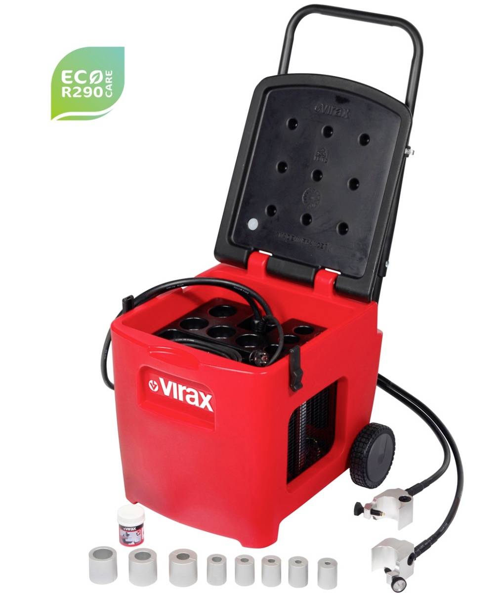 Tragbare rote Virax-Maschine mit geöffnetem Deckel und Griff, die obere Lüftungsschlitze, Schlauch, Räder und mitgelieferte Beschläge zeigt; 