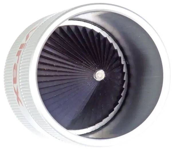Close-up of a circular black turbine or fan impeller inside a silver housing on a white background.