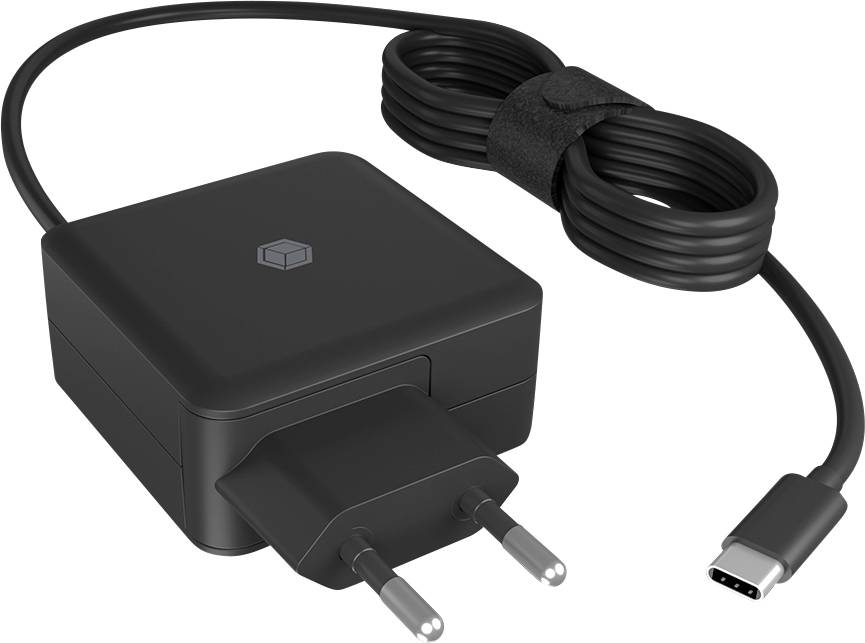 Ein schwarzes Wandladegerät mit Stecker und aufgerolltem USB-C-Kabel, geeignet für elektronische Geräte.
