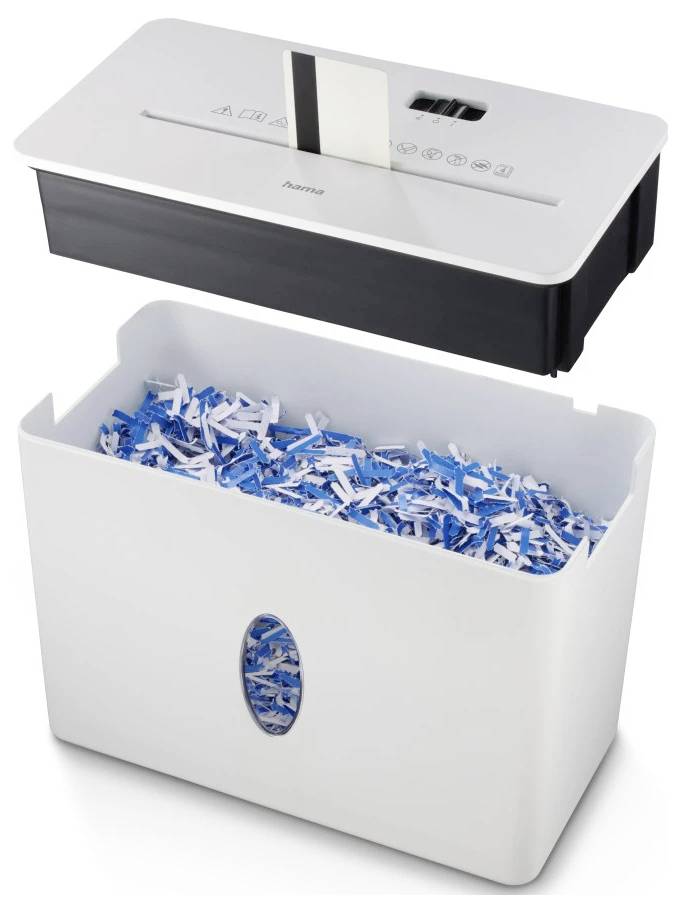 Ein Aktenvernichter mit geöffnetem Behälter, der voll mit zerrissenen blauen und weißen Papierstreifen ist. Die Maschine wird gezeigt, während ein Papierblatt gerade zerrissen wird.