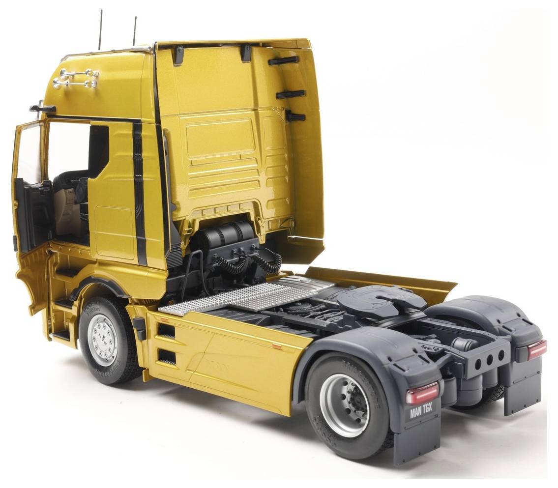 Solido LKW Modell MAN TGX 2023 gold Fertigmodell LKW Modell