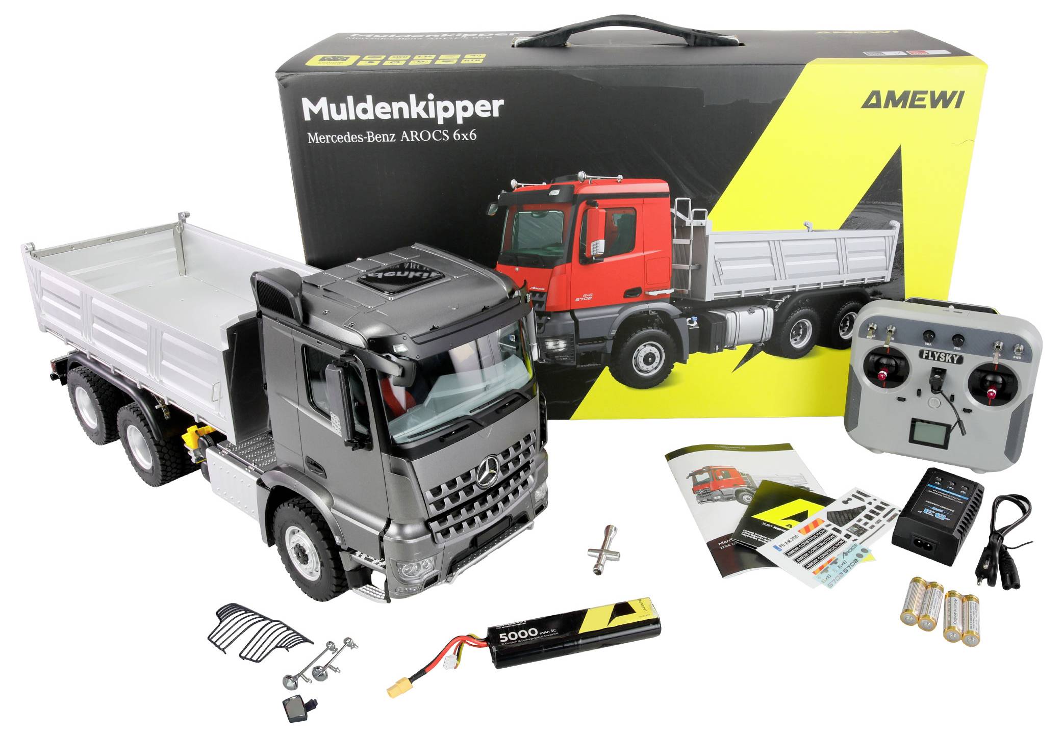 Ein Spielzeug-LKW-Set mit einem schwarzen Truck, Fernbedienung, Batterien und Zubehör. Die Verpackung zeigt einen roten Truck und Produktbranding.
