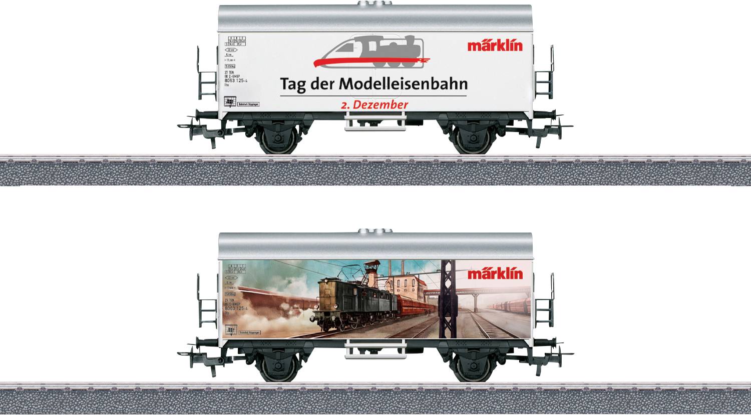 Zwei Modelleisenbahn-Kesselwagen auf Schienen. Oberer Wagen wirbt für den 'Tag der Modelleisenbahn' am 2. Dezember. Unterer Wagen zeigt ein historisches Zugbild.