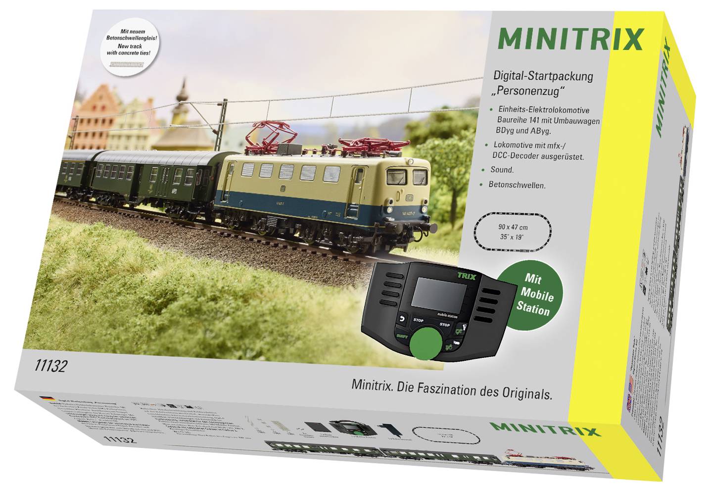 Minitrix Modelleisenbahn-Starterset in einer Schachtel mit einer elektrischen Lokomotive, zwei grünen Personenwagen und einer Mobile Station-Steuereinheit.
