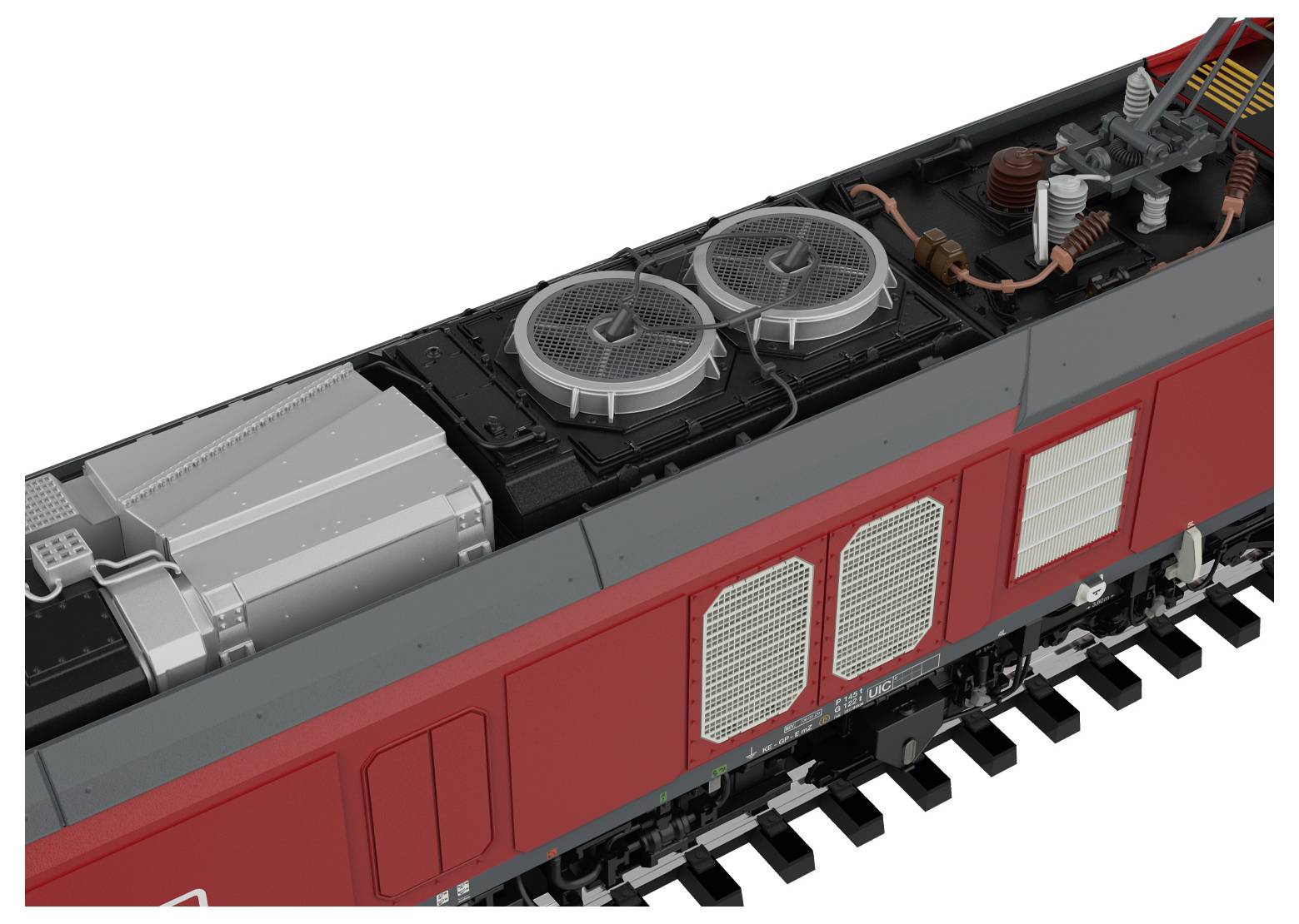 Draufsicht des Daches einer roten Lokomotive mit Details zu Kühlventilatoren, Lüftungsöffnungen und elektrischen Komponenten, die mechanische Konstruktionsmerkmale veranschaulicht.