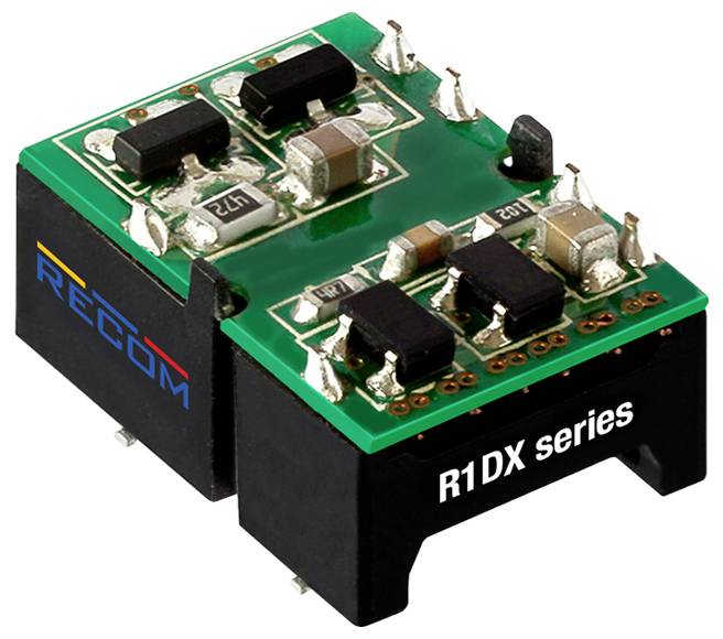 Eine rechteckige elektronische Komponente mit grünen Schaltkreisen und schwarzen Teilen, auf deren Seite 
