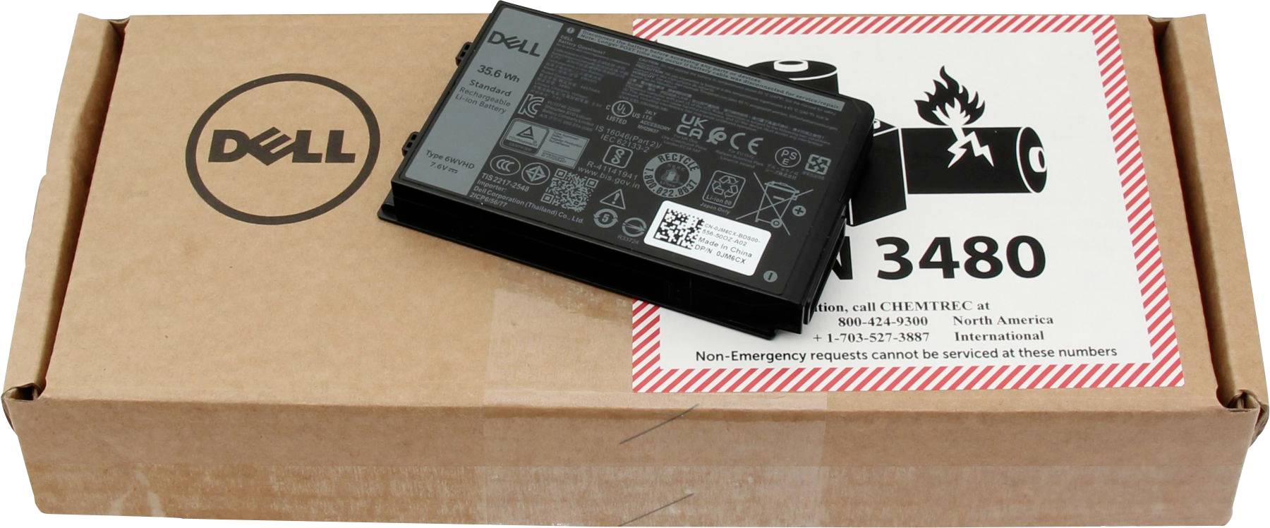 Dell-Akku auf einer Pappschachtel mit Brandwarnhinweis. Wichtig für sichere Handhabungs- und Lagerungsanweisungen.