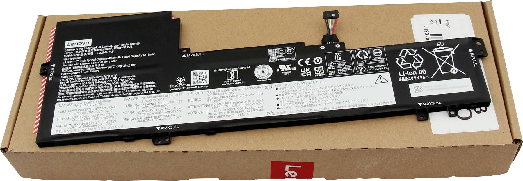 Eine schwarze Lenovo-Lithium-Ionen-Laptop-Batterie, die auf einer Pappoberfläche mit sichtbaren Spezifikationen und Recycling-Symbolen platziert ist.