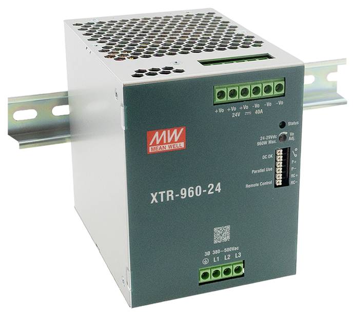Netzteil auf Hutschiene, beschriftet als 'MW Mean Well XTR-960-24'. Verfügt über mehrere Anschlussklemmen und Signalleuchten zur Verbindung und Statusanzeige.