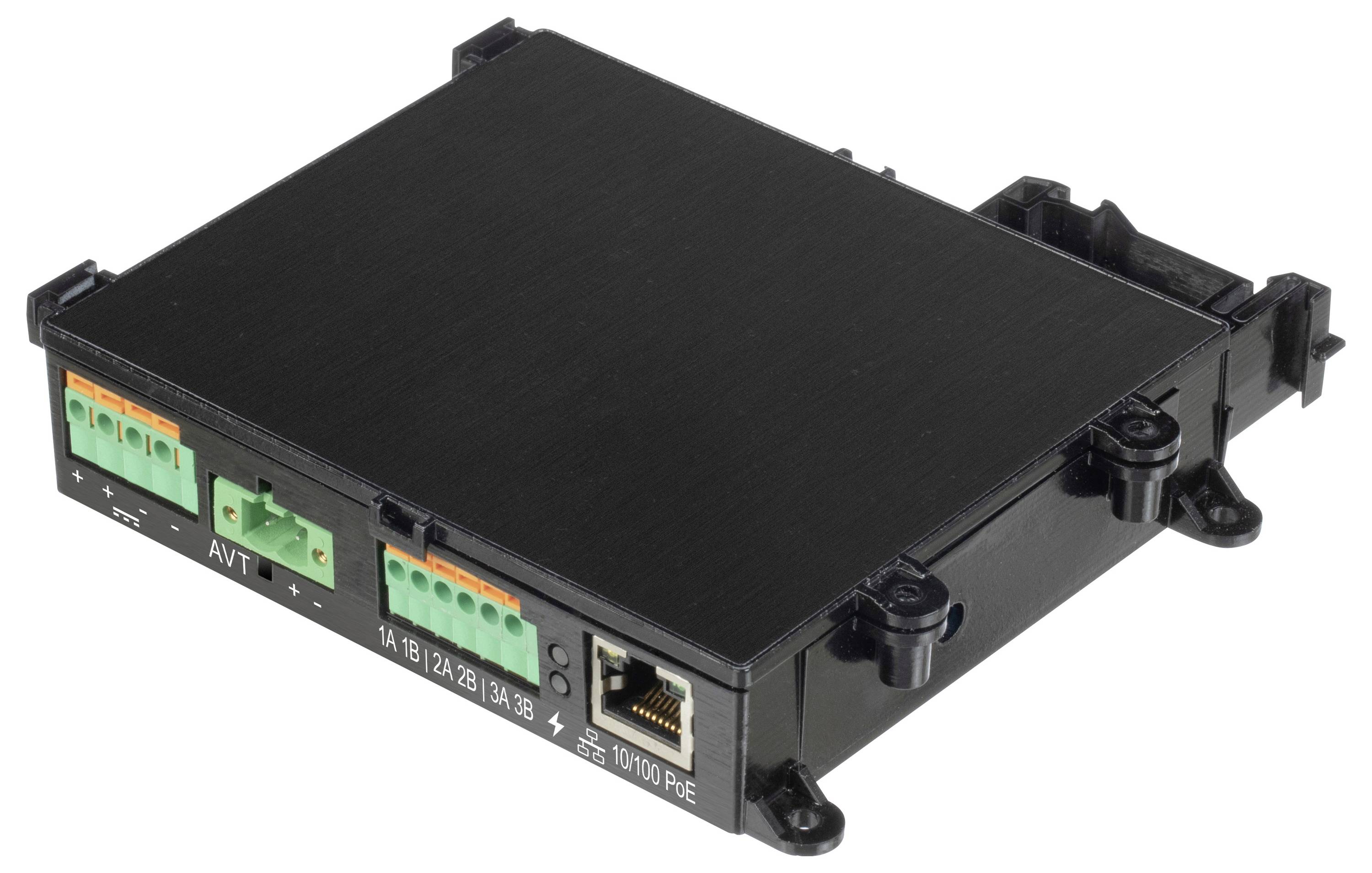 Eine schwarze elektronische Geräte-Box mit mehreren grünen und orangen Anschlüssen an der Seite, die beschriftete Ports wie AVT und I/O sowie einen Ethernet-Anschluss mit der Markierung 'PoE' aufweist.