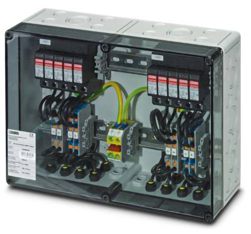 Elektrische Anschlussdose mit transparentem Deckel, die interne Verkabelung, Anschlüsse und Sicherungsautomaten zeigt, die in zwei Abschnitten organisiert sind.