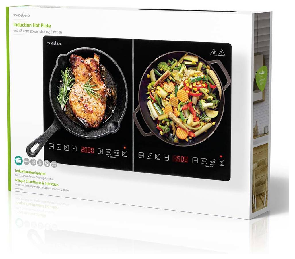 Die Abbildung zeigt die Verpackung einer Induktions-Kochplatte mit zwei Kochzonen und digitalen Displays. Eine Zone zeigt Fleisch mit Gewürzen beim Braten; die andere Zone präsentiert gemischtes Gemüse.