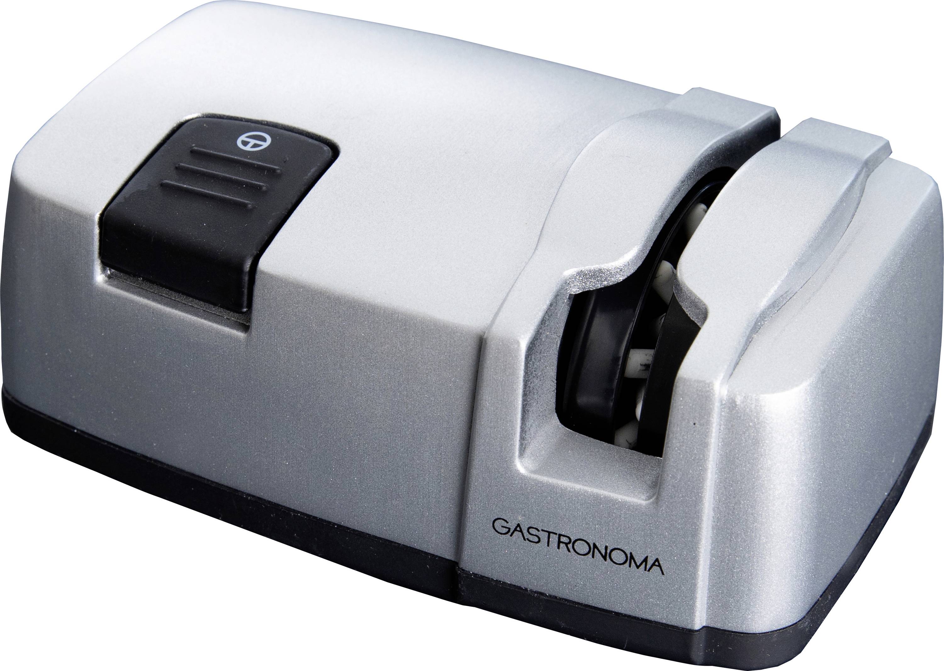 Ein silberner elektrischer Messerschärfer mit einem sichtbaren Schleifschlitz und einem schwarzen Knopf oben.