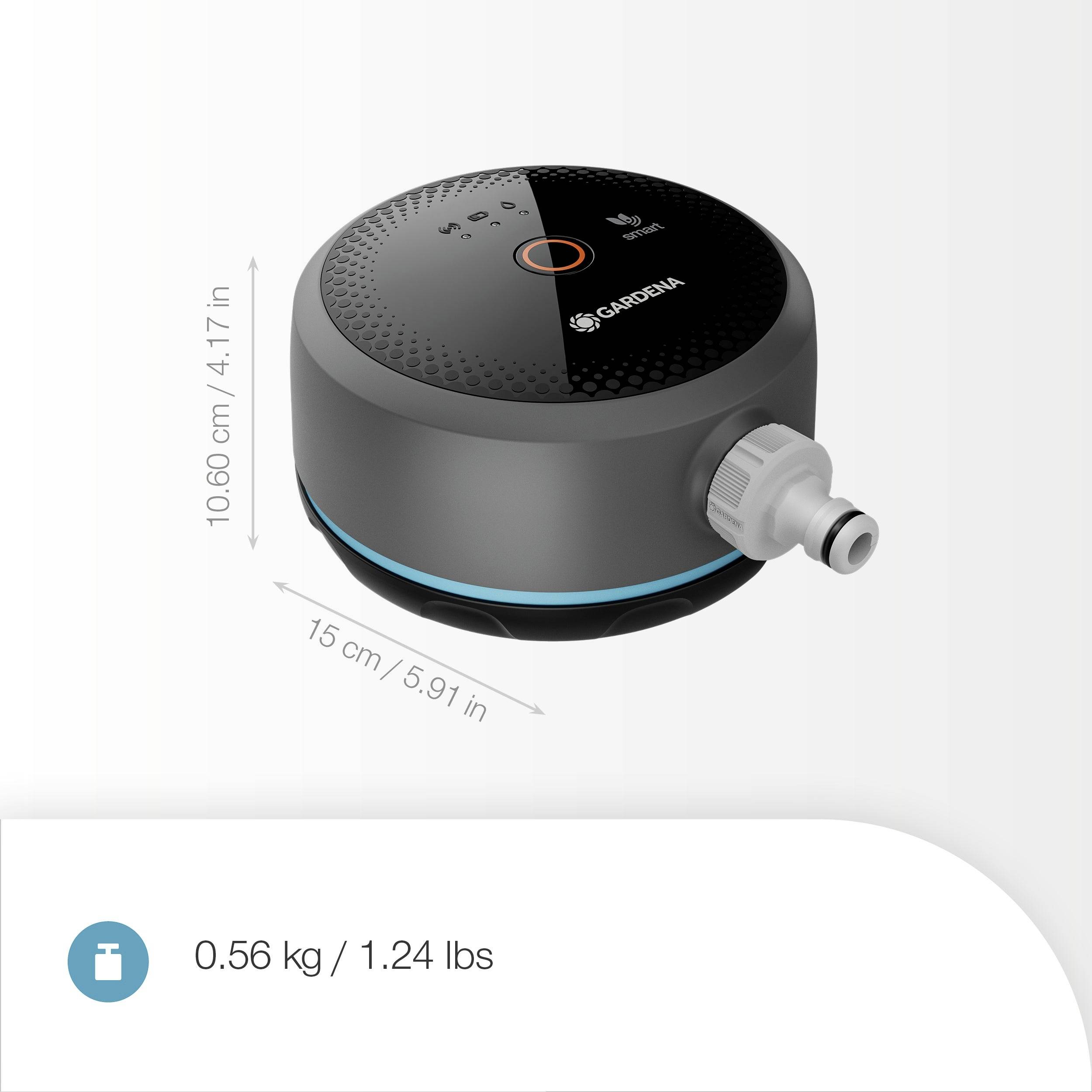 Schwarzes und graues Kreisgerät mit Schlauchanschluss, 10,6 cm hoch und 15 cm breit, mit einem Gewicht von 0,56 kg (1,24 Pfund).