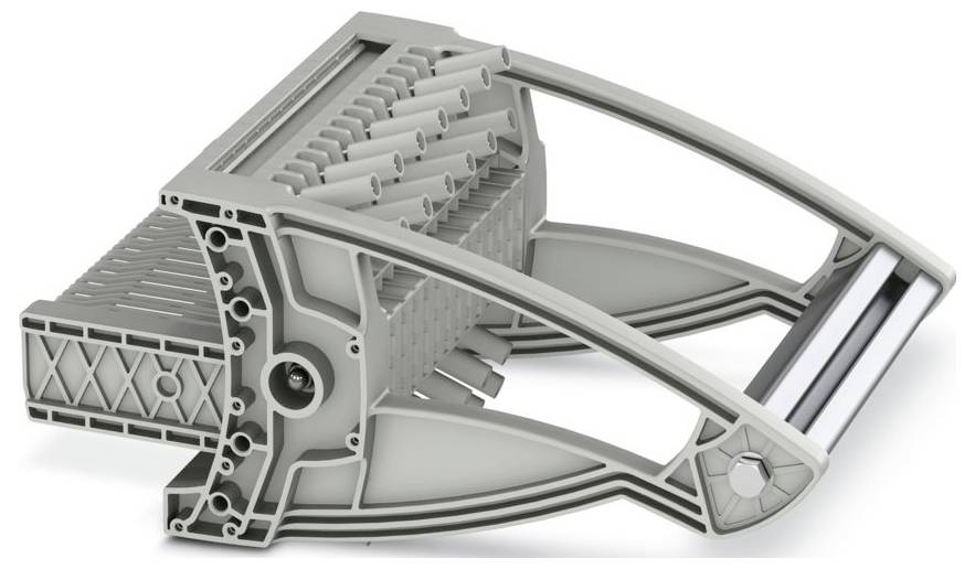 Eine graue, kantige mechanische Komponente mit mehreren Schlitzen und gekrümmten Stützen, möglicherweise ein Teil von Industrieausrüstung oder Maschinen.