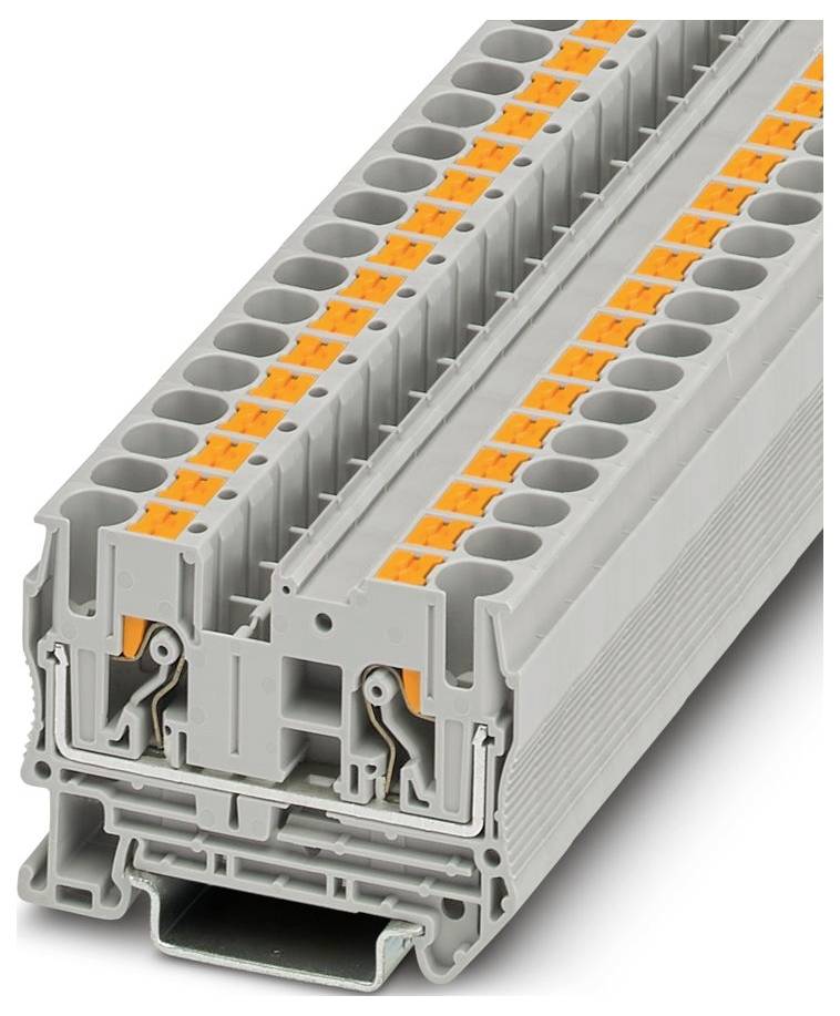 Eine Nahaufnahme eines gelben Klemmblocks, der in elektrischen Installationen verwendet wird, mit mehreren Verbindungspunkten für die Verkabelung.