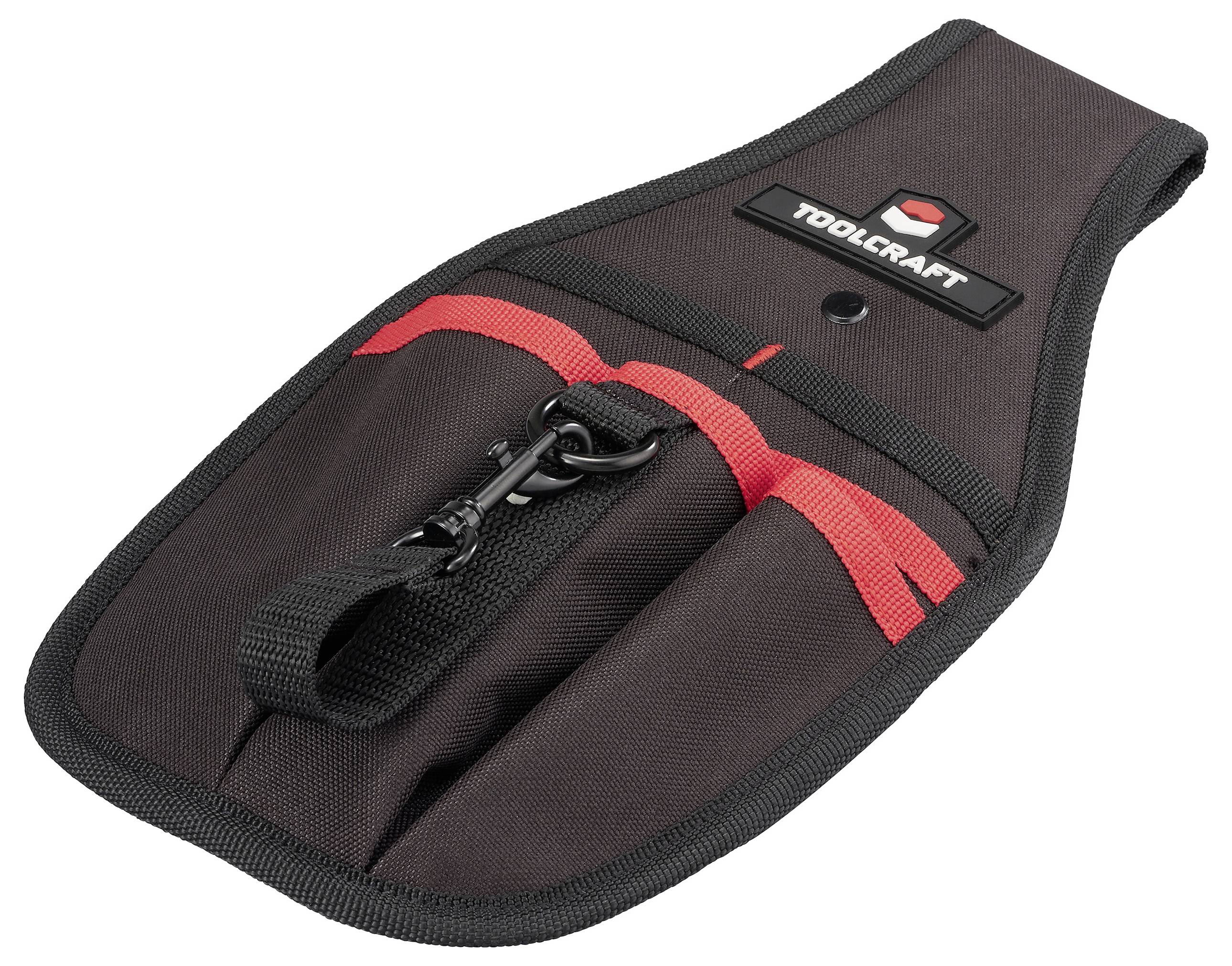 Eine schwarze und rote Werkzeugtasche von Toolcraft mit mehreren Taschen, konzipiert zum Tragen und Organisieren von Handwerkzeugen, mit einem Verschlusriemen.