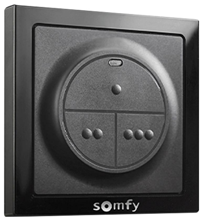 Eine schwarze Wandhalterung-Fernbedienung mit vier Tasten, die in einem kreisförmigen Muster angeordnet sind, mit der Beschriftung 