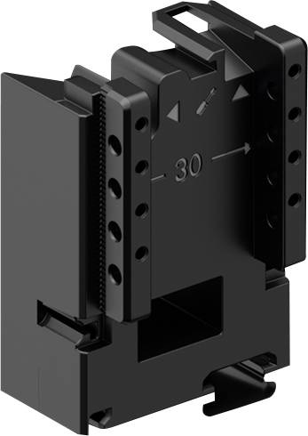 Ein schwarzes Plastikgerät, wahrscheinlich ein modularer Anschluss oder Halter, mit einer '30' Markierung und einem Pfeil, ausgestattet mit mehreren Löchern und Schlitzen.