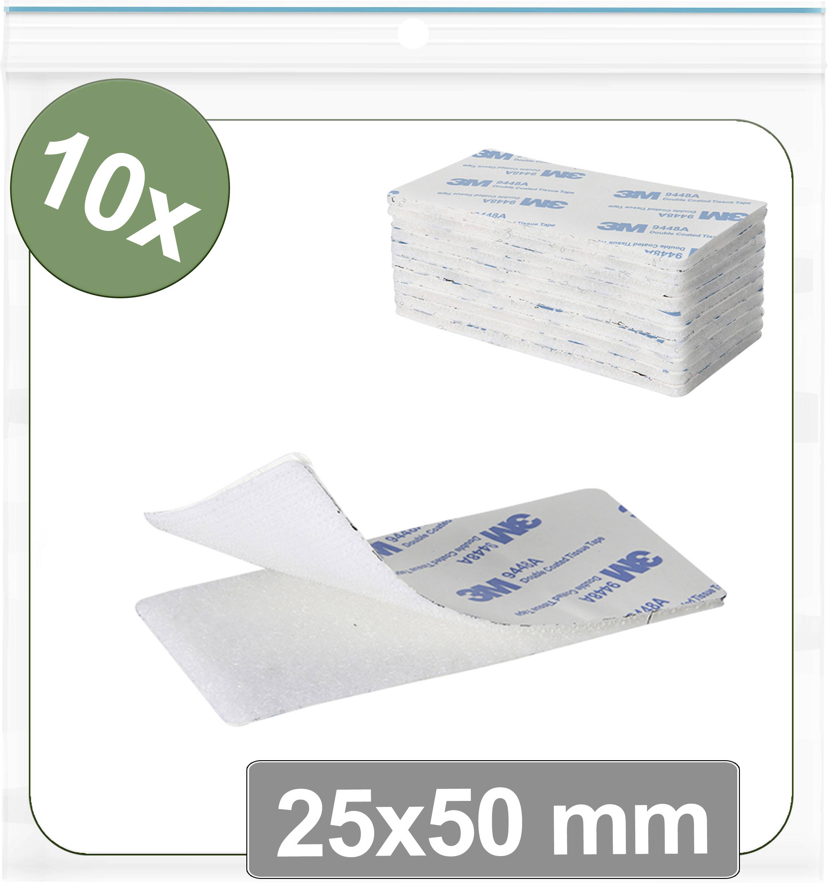 '10x 25x50 mm' Klebepads im Paket; Nahaufnahme zeigt einen Pad, der abgezogen wird und die Klebseite freilegt.