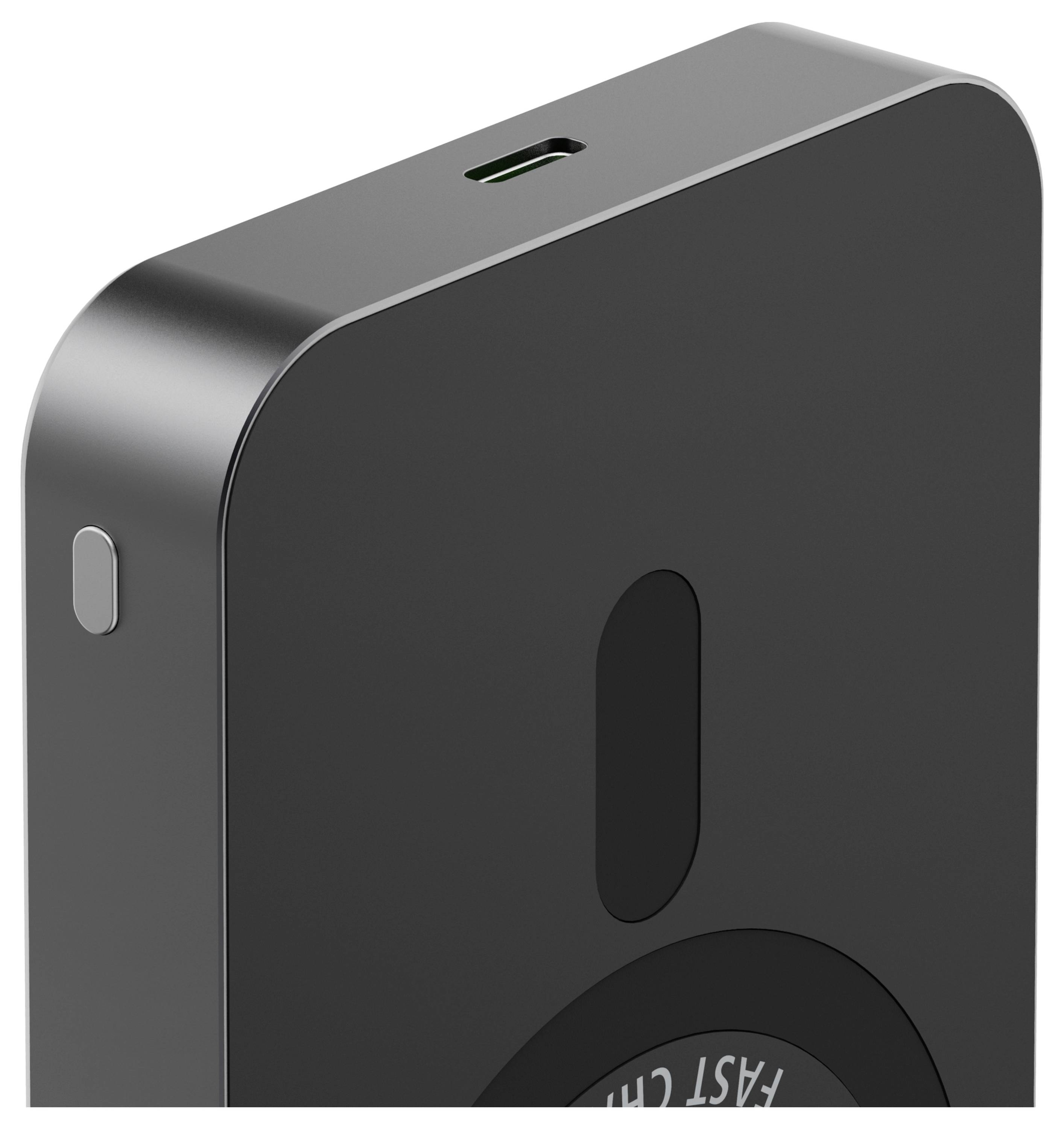 Eine Nahaufnahme einer schwarzen Geräteecke mit einem USB-C-Ladeanschluss und der Aufschrift „Schnellladen