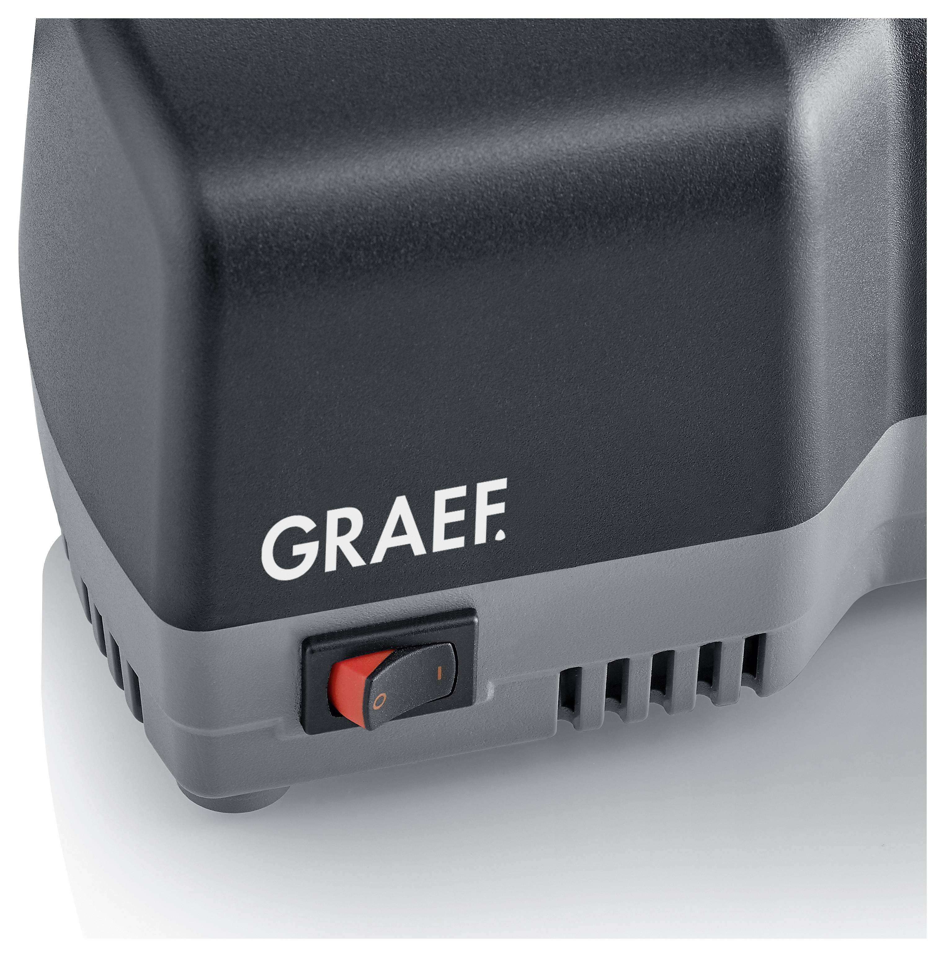 Elektrisches Gerät mit einem 'Graef'-Logo und einem roten Ein/Aus-Schalter, von einem nahen Winkel aus gezeigt.