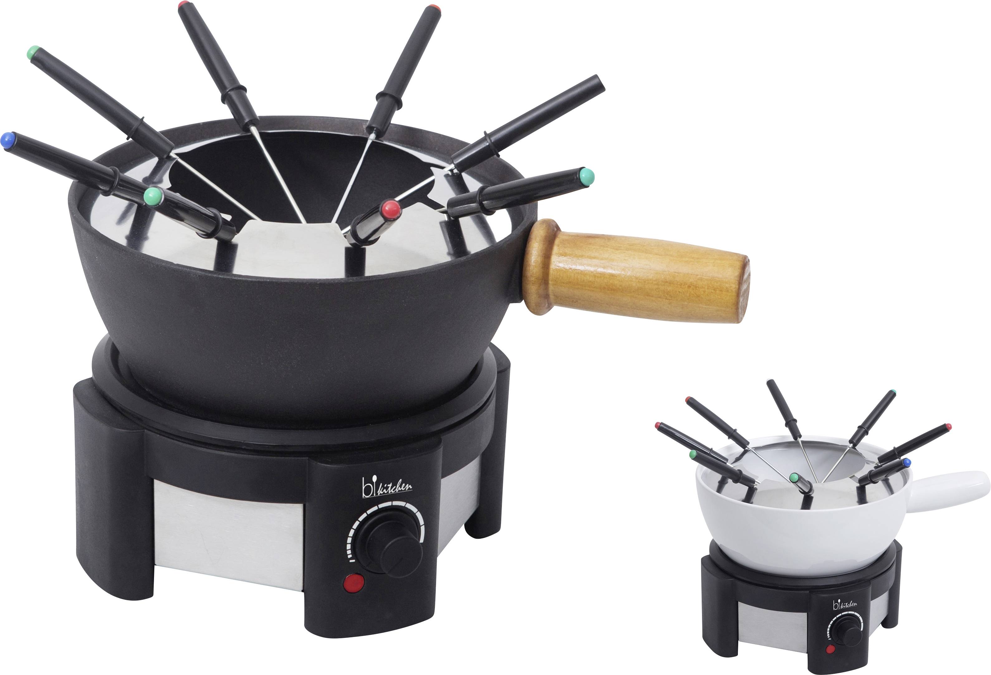 Ein schwarzer elektrischer Fondue-Satz mit Spießen steht neben einem kleineren weißen Satz. Beide verfügen über Holzgriffe und Temperaturregler.