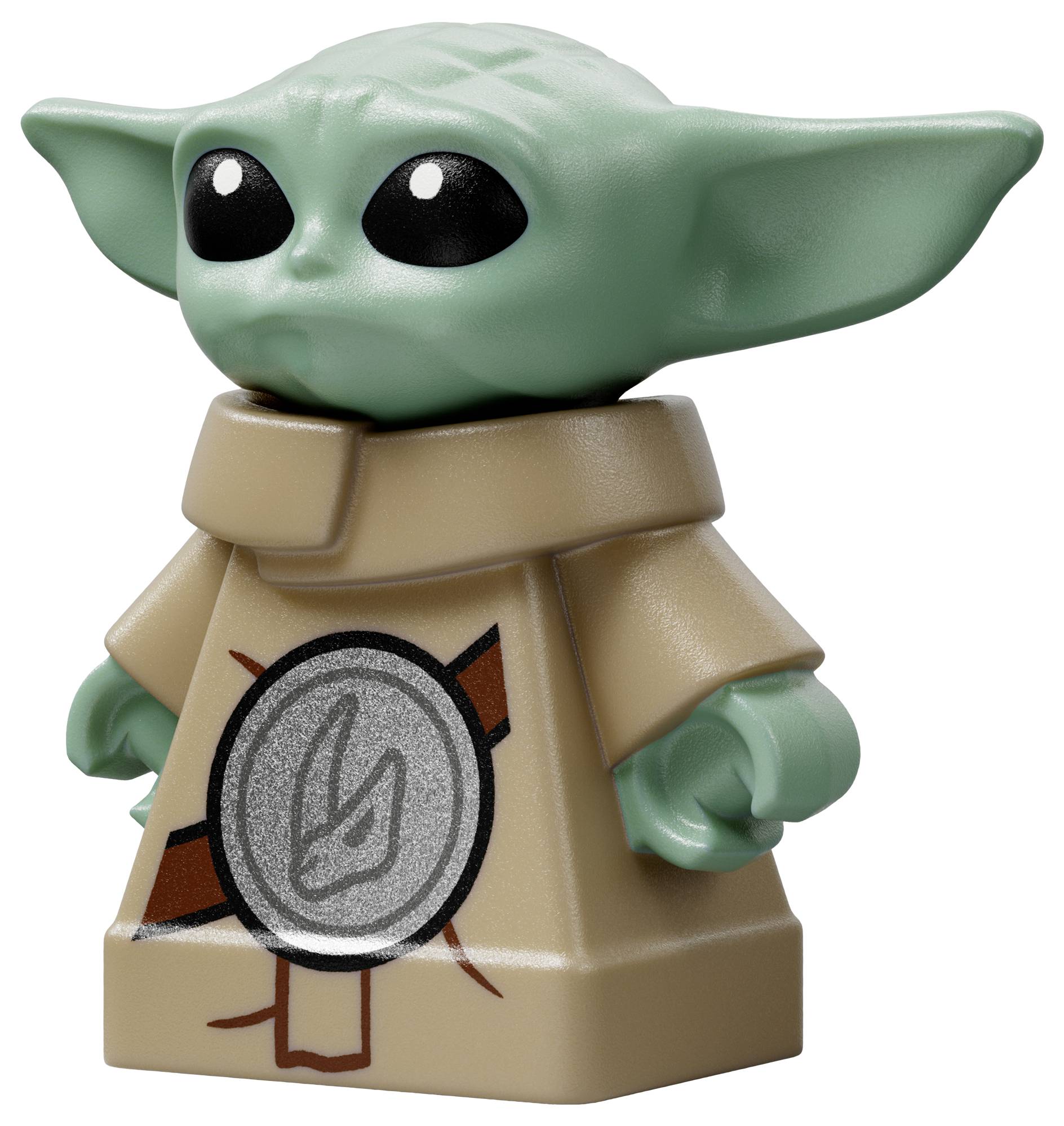 Eine grüne, großohrige Spielzeugfigur mit schwarzen Augen, die einen beigen Anzug trägt, der mit einem runden Emblem auf der Vorderseite verziert ist.