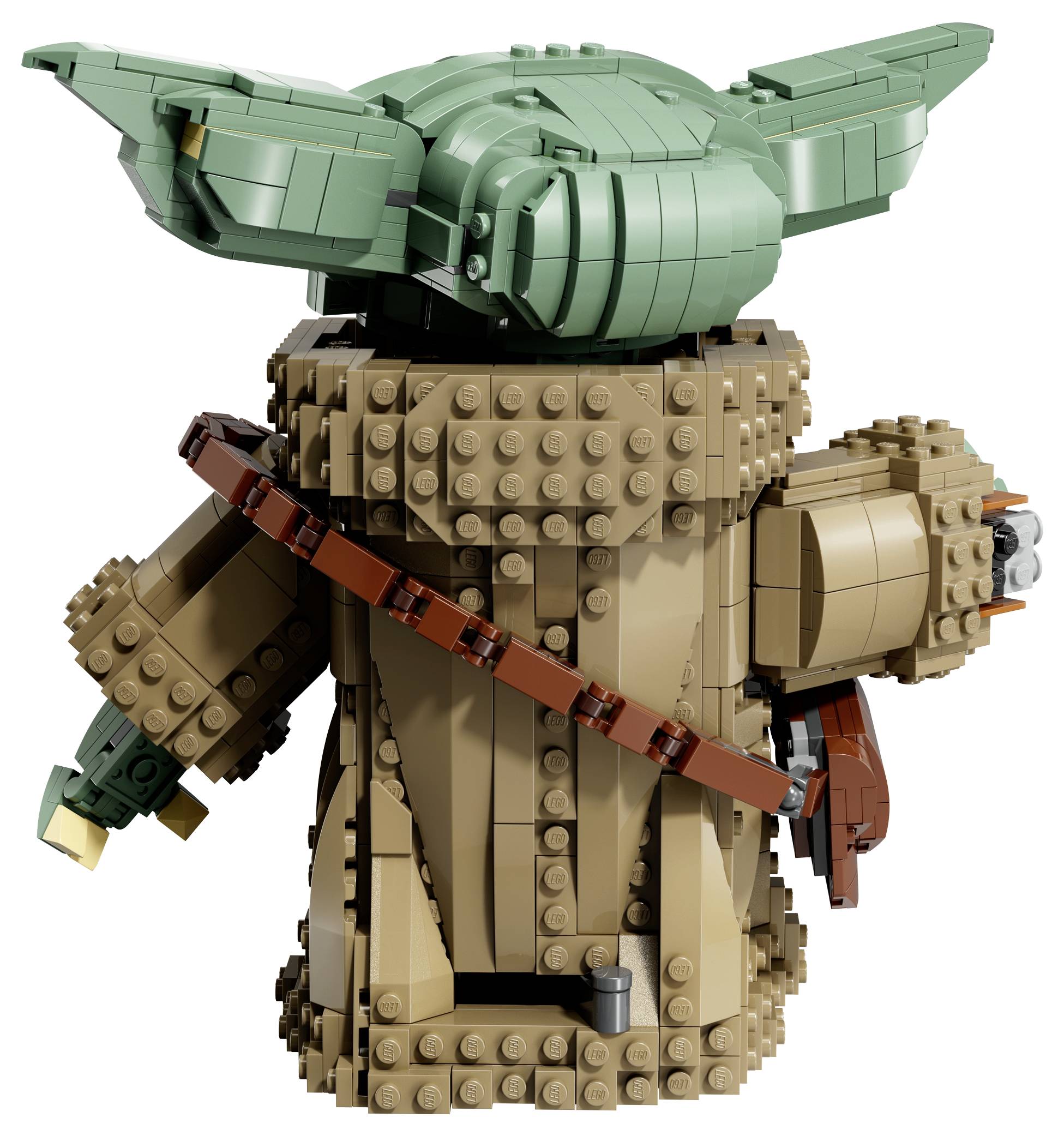 Eine detaillierte Lego-Figur einer Figur mit grünen Ohren und einem braunen Gewand. Die Figur wird von hinten gezeigt und hält ein kleines Objekt.