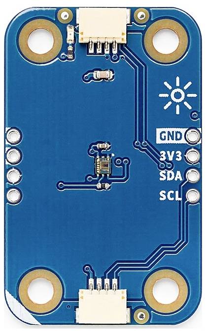 Eine kleine blaue Leiterplatte mit Anschlüssen, die mit 'GND', '3V3', 'SDA' und 'SCL' beschriftet sind. Sie zeigt ein Glühbirnen-Symbol und verschiedene elektronische Komponenten.
