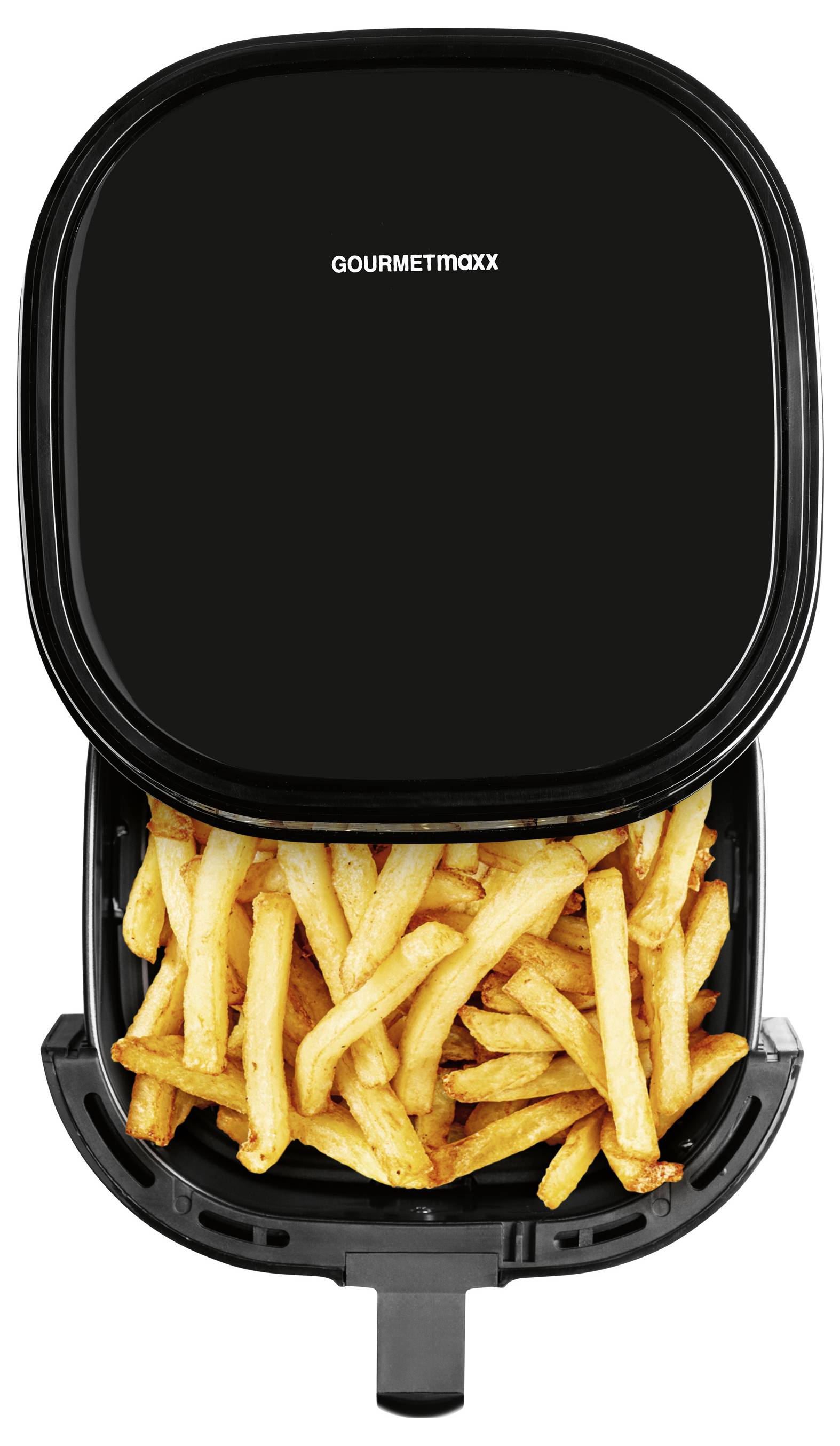 Ein Heißluftfritteuse gefüllt mit knusprigen, goldbraunen Pommes frites. Der Deckel des Geräts ist geöffnet und zeigt die Pommes, die bereit sind, serviert zu werden.