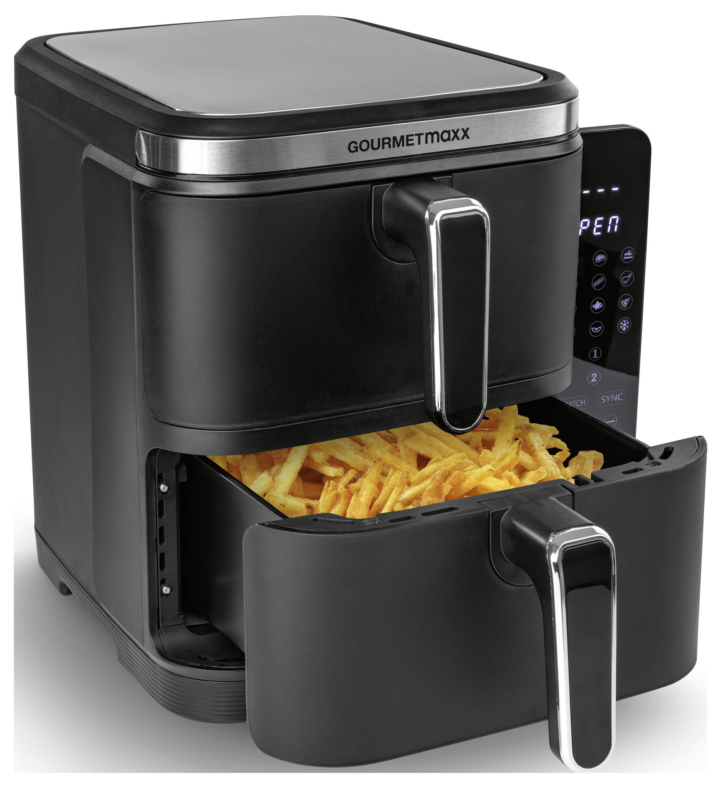 Ein schwarzer Heißluftfritteuse mit Edelstahlakzenten, deren Schublade geöffnet ist und knusprige Pommes frites enthält; digitale Bedienelemente sind seitlich sichtbar.