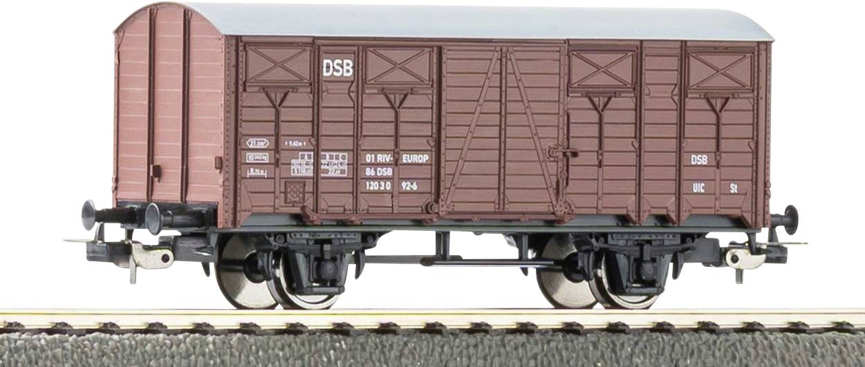 'Ein Modellzug-Güterwagen mit brauner Außenseite und weißem Text mit der Aufschrift 