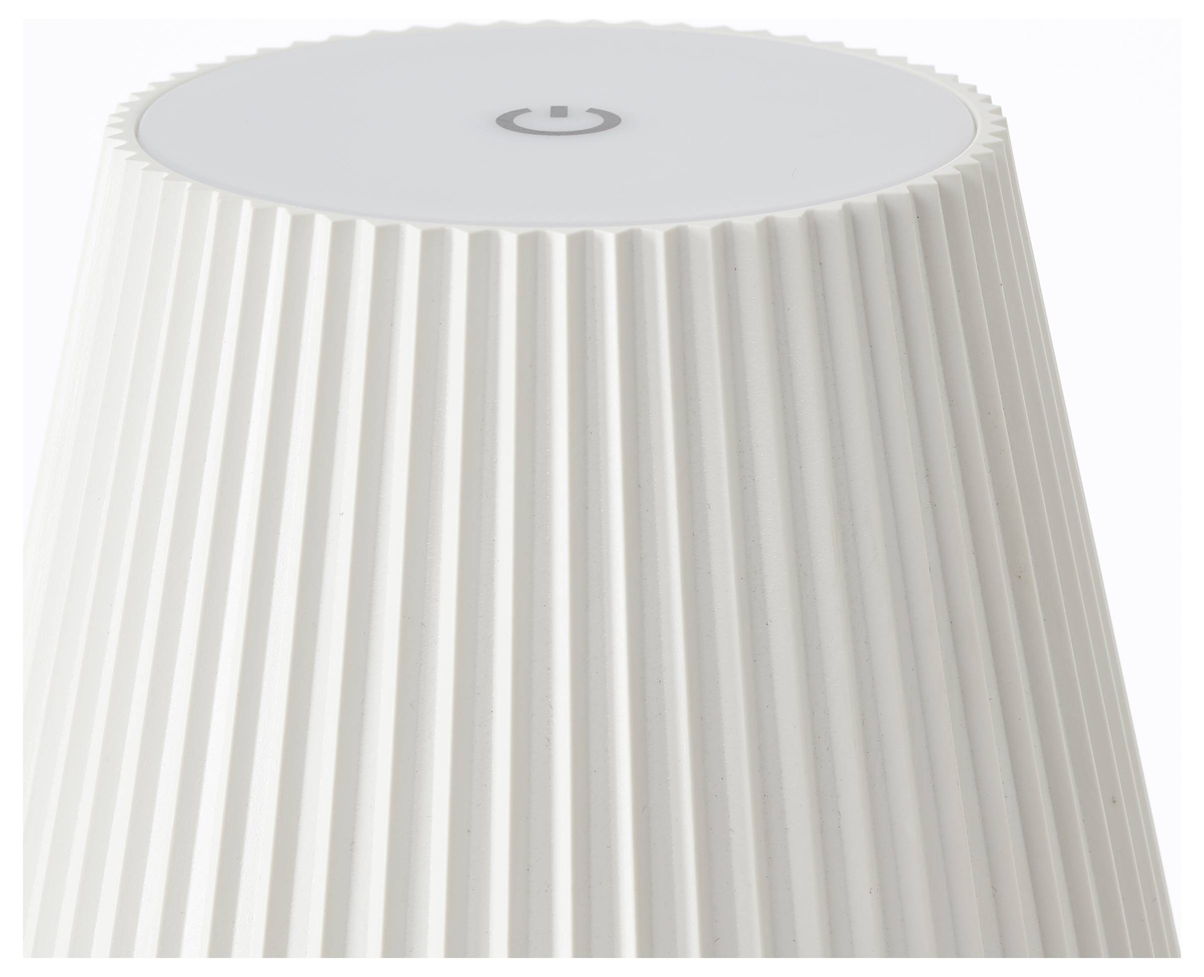 Weiße Tischlampe mit einer gefalteten Oberfläche und einem Einschaltknopf oben.