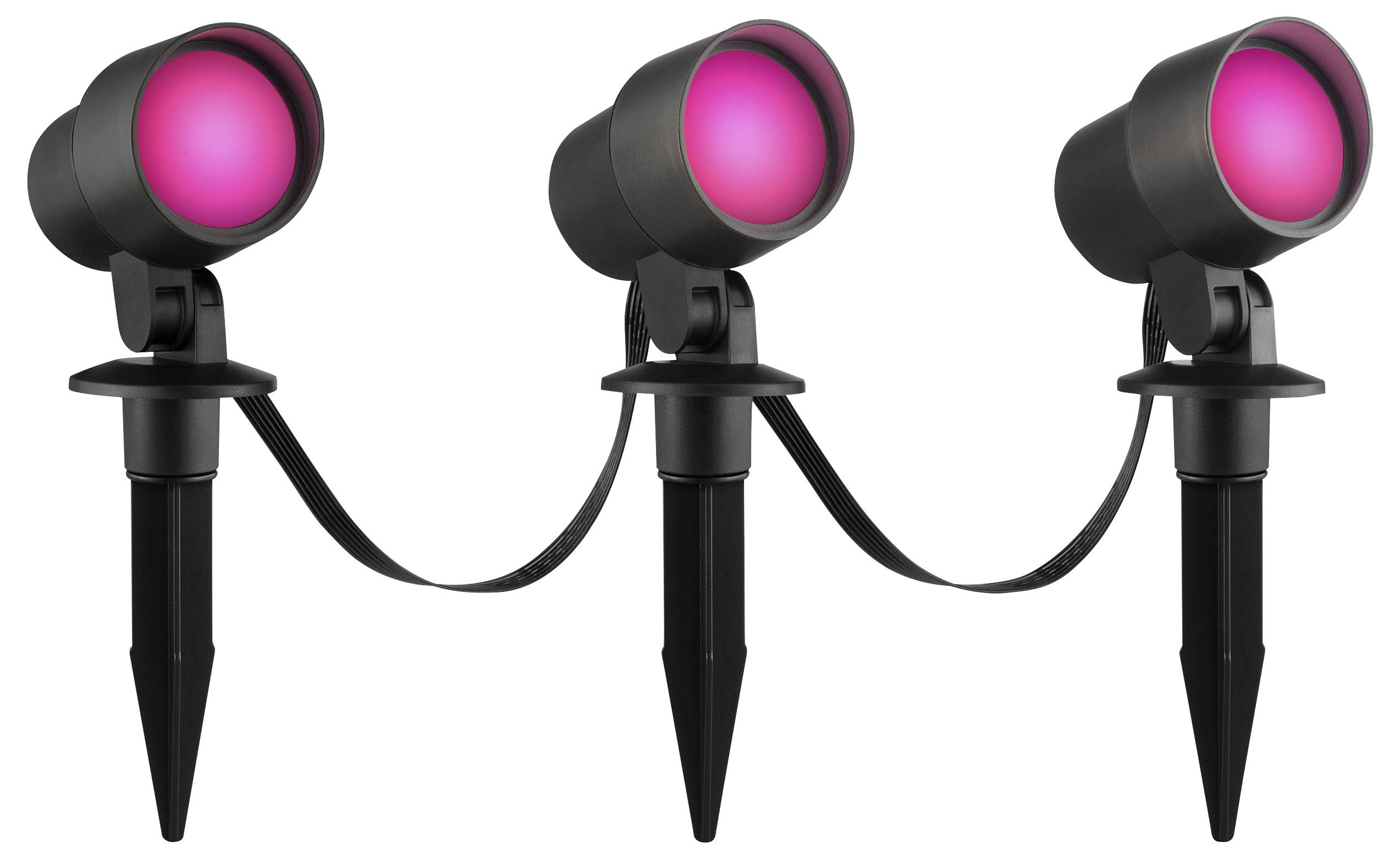 Drei verbundene Outdoor-LED-Scheinwerfer mit rosa Licht auf Erdspießen für Garten- oder Landschaftsbeleuchtung.