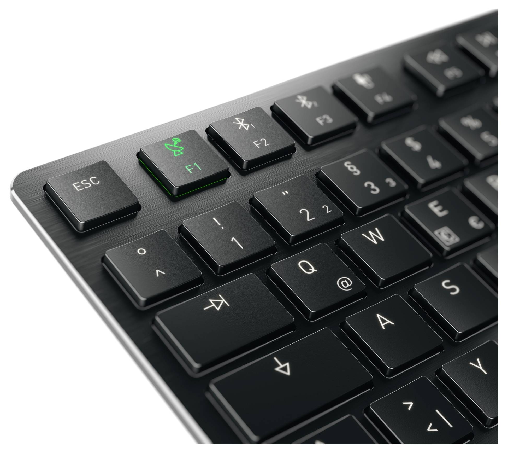 Eine Nahaufnahme einer schwarzen Computertastatur mit der hervorgehobenen F1-Taste in Grün, die ein SchmetterlingsSymbol enthält und eine bestimmte Funktion andeutet.