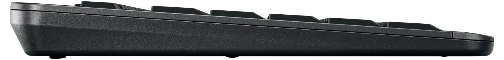 Seitenansicht einer schwarzen Computertastatur mit einem geneigten Profil und erhobenen Tasten.