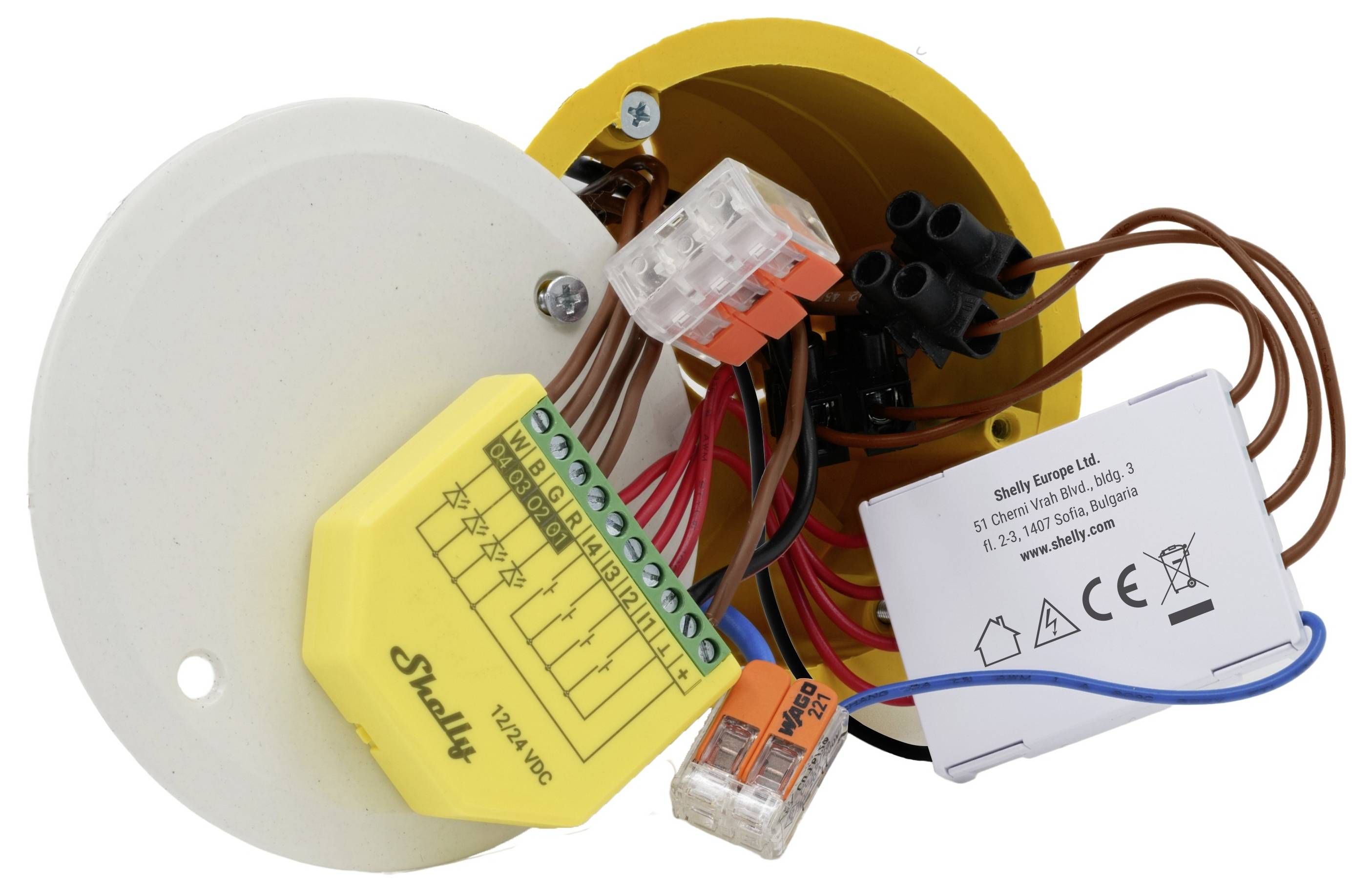 Elektrischer Verteilkasten mit Verdrahtungskomponenten, Klemmenleisten und einem Kondensator, der zum Verbinden und Organisieren von Stromkreisen verwendet wird.