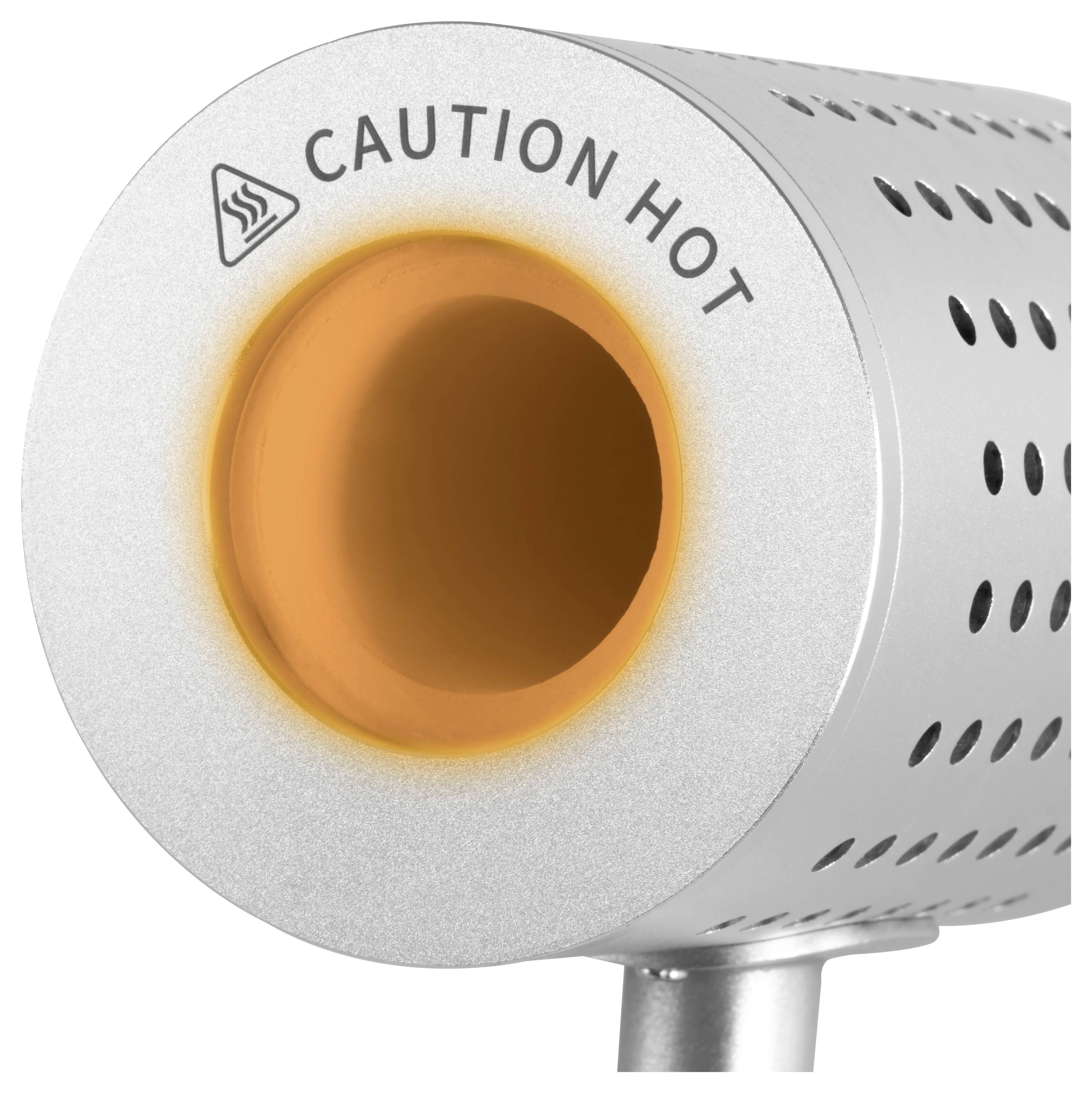 Nahaufnahme eines metallischen Geräts mit einer orange leuchtenden Öffnung mit der Bezeichnung „CAUTION HOT
