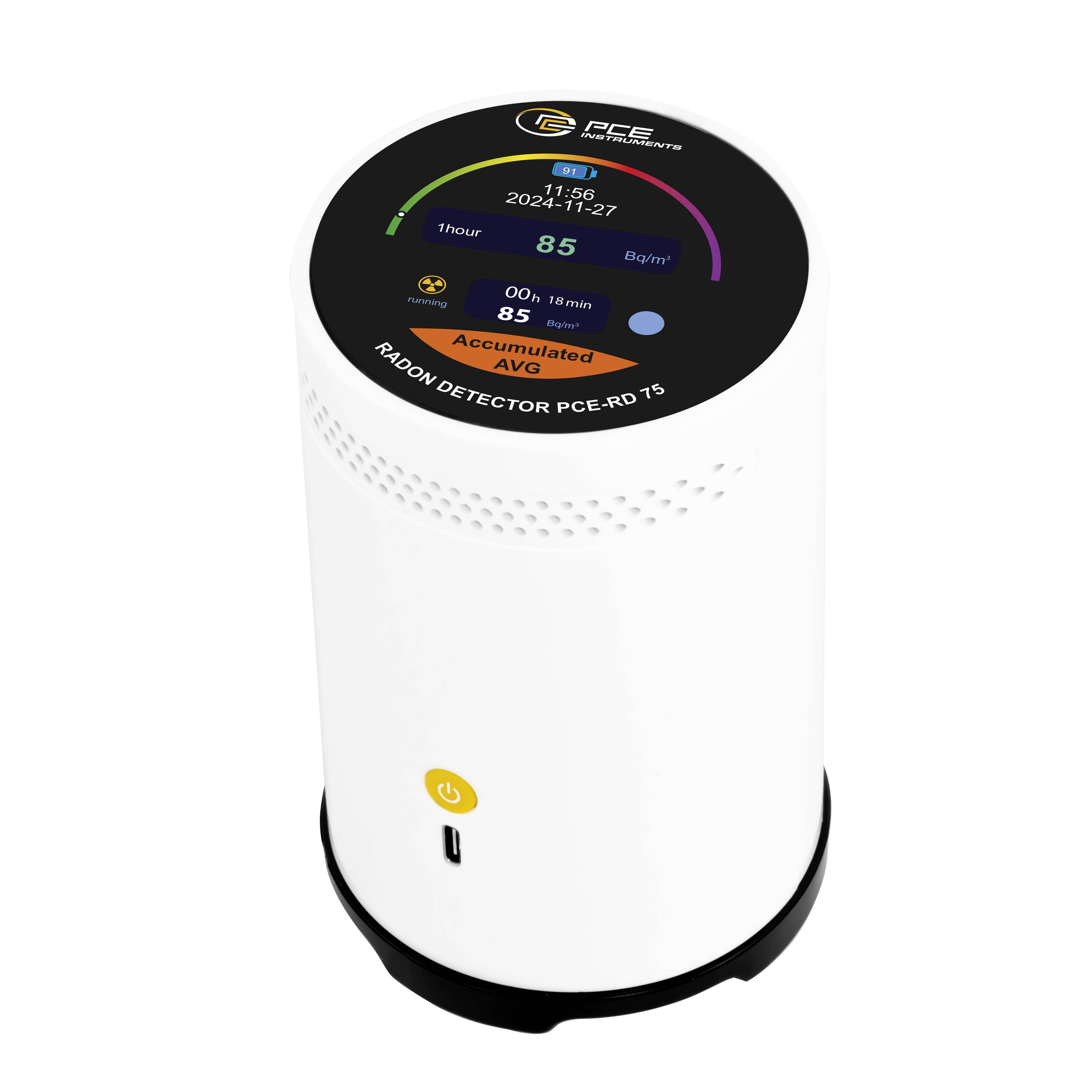 White cylindrical PCE radon detector with digital display showing radon readings and accumulated average on the top screen.