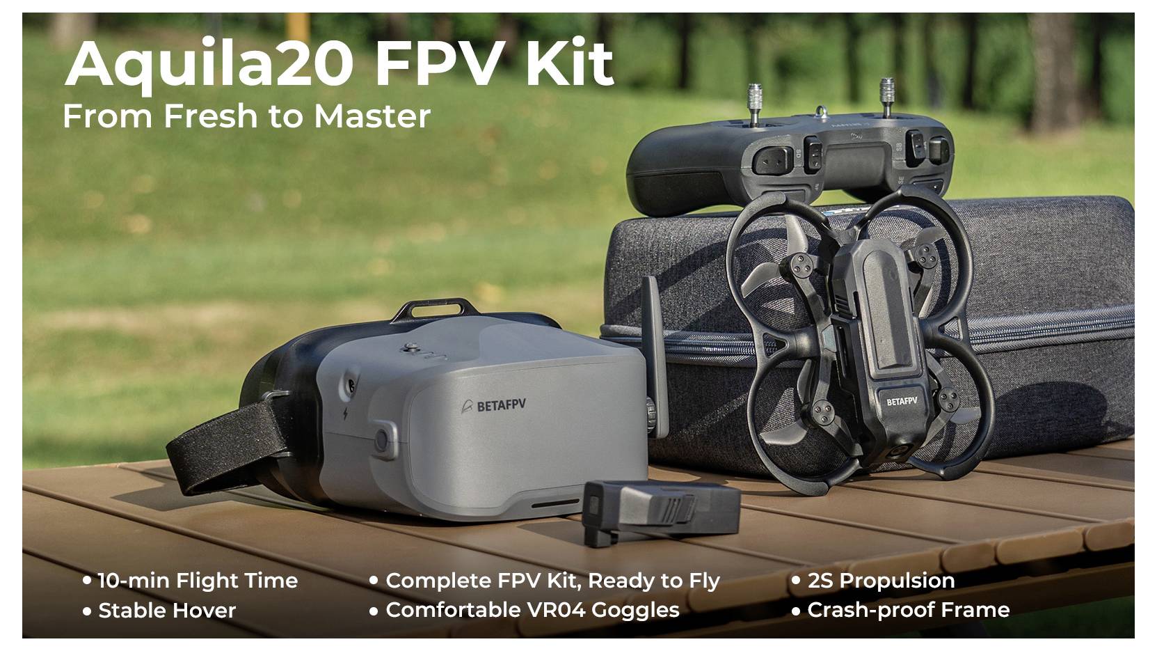 Aquila20 FPV Kit von BetaFPV auf einem Tisch im Freien, das ein graues VR-Headset und eine FPV-Drohne mit Fernsteuerung zeigt und ein flugfertiges Kit bewirbt.